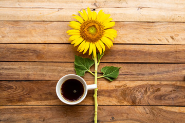 yellow flowers sunflower in spring season with hot coffee espresso arrangement flat lay postcard...