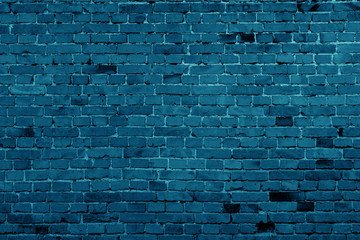 Fototapeta na wymiar Blue brick building wall. Interior of a modern loft. Background for design and interview recording.