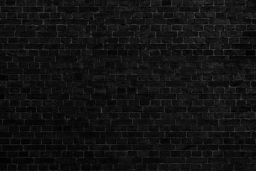 Black brick building wall. Interior of a modern loft. Background for design and interview recording.