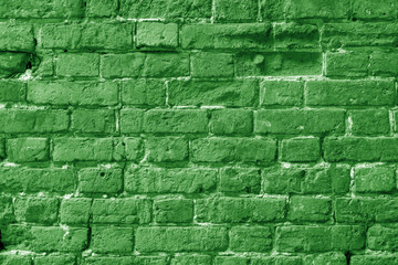 Green brick building wall. Interior of a modern loft. Background for design and interview recording.