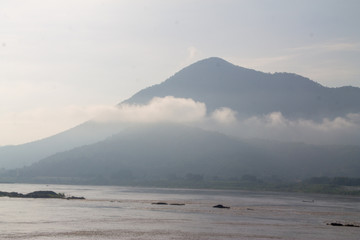 Mountain lake shore landscape. Mountain lake view. Lake in mountains. Mountain forest lake