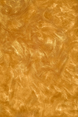 Bright gold glitter texture for background.