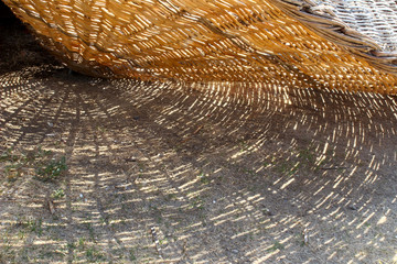 straw umbrella detail on the beach