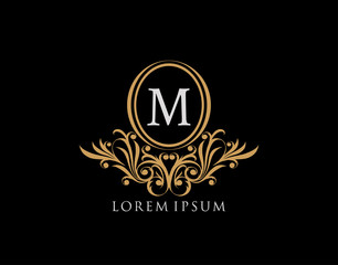 Luxury M Letter Logo. Luxury calligraphic vintage emblem with beautiful classy floral ornament. Elegant logo design Vector illustration.