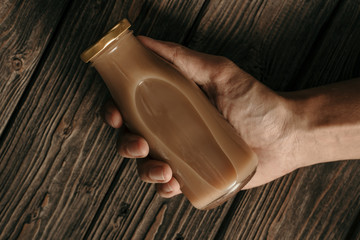 close up of coffee on a glass bottle product mockup