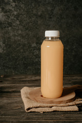 fresh liquid food product on blank plastic container bottle mockup