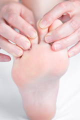 Foot pain, foot massage, physiotherapy