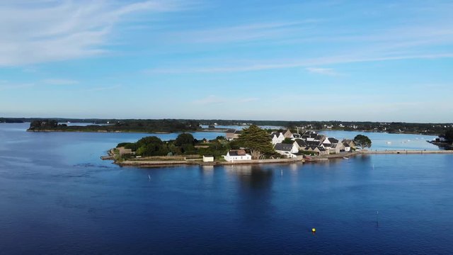 touristic drone shot of Saint Cado islet. Half way between Lorient and Quiberon, the &Eacute;tel river flows near this town, which once one France&rsquo;s most important tuna fishing ports. beautiful island