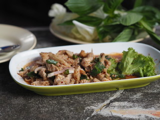 Slide grilled pork salad on plate, Thai food