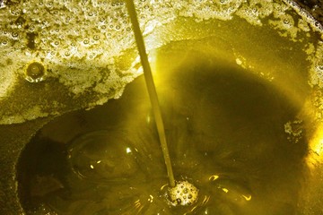 Extra virgin olive oil extraction process in olive oil mill in Greece.