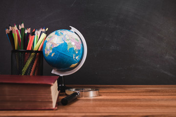 back to school concept. stationery items on wooden desk