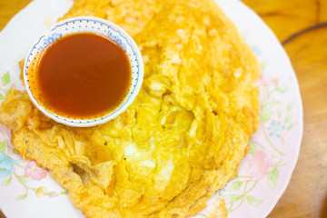 Crispy fried white crab meat omelette served with hot chili sauce
