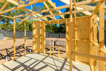 New Australian brick veneer house construction  site viewed from inside frame