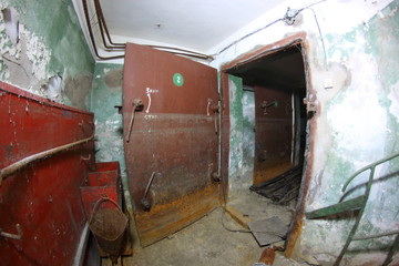 Fototapeta na wymiar rooms of an abandoned flooded bomb shelter