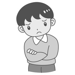 首を傾げて考え事をする男の子