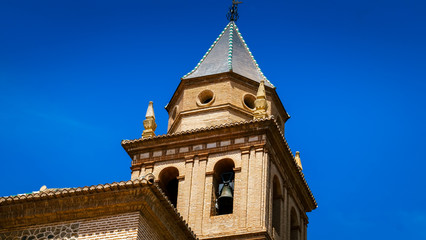 Fototapeta na wymiar Parroquia de Santa María de la Encarnación (Church of Santa Maria) located in the Alhambra complex - Alhambra, Granada, Spain - August 27th 2016