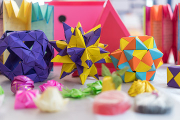 Multicolor modular origami star sphericalal of modular origami spiky ball model decoration visual art on geometry paper folding and difficult level skills and experience in study at school - obrazy, fototapety, plakaty