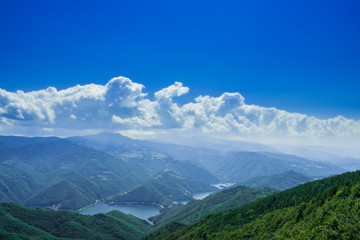 Fototapeta premium View of Vacha water reservoir from Bekovi Rocks, Rhodopes Mountains, Ravnogor, Bulgaria