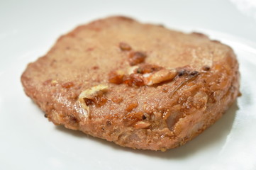 fried salty pork sirloin with garlicanf pepper on plate