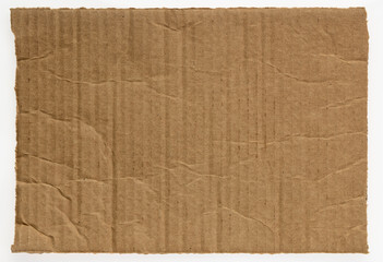 rectangular piece of corrugated brown cardboard isolated on white