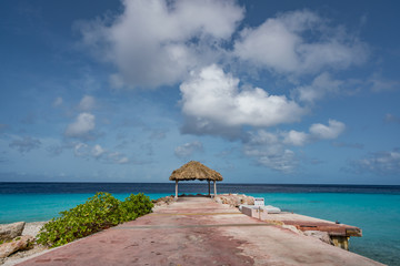 An artist and her artwork  Views around the Caribbean island of Curacao