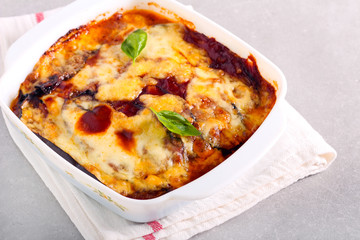  aubergine bake in sauce under melted cheese