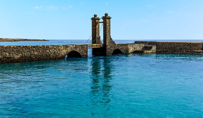 A view of the causeway and the bascule bridge in Arrecife, Lanzarote on a sunny afternoon