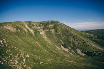 A sign on the side of a mountain