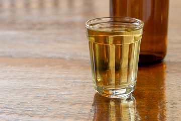 Glass and bottle of cachaça, a typical Brazilian drink. Brazilian export product, distilled drink known as brandy or drip. The national 