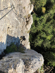 a rope on the rock for climbing