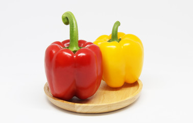 bell pepper in wooden plate