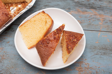 Tea cake Banana, coconut bread, cake on wooden background. Slice of yogurt cake. Fresh healthy brunch- banana cake slices. butter scotch loaf for Christmas, birthday, New year