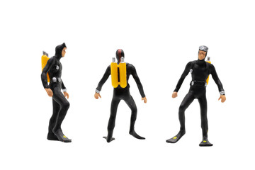 Miniature people : Scuba diver isolated on white background with clipping path