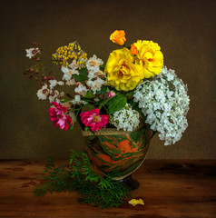 Flower composition. Still life with a bouquet of garden flowers.