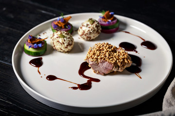 Tender meat with puffed rice. Dish of authors cuisine. Turkey meat recipe from a restaurant.
