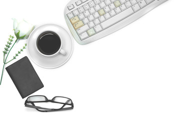 White office desk, top view with coffee laptop, white flower notebook, flat lay glasses with free space