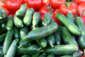 close-up tomatoes and cucumbers at market