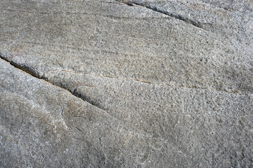 abstract gray stone background with rough textured surface. template for design