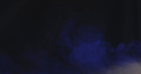 Multicolored smoke flies through the air