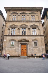 Fototapeta na wymiar Antique building at Holly Trinity square in Florence Italy
