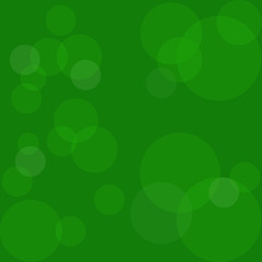 Abstract green background with circles.