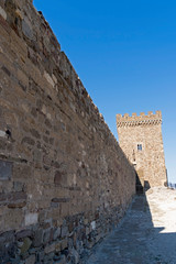 ancient historic Genoese castle or fortress against the blue sky