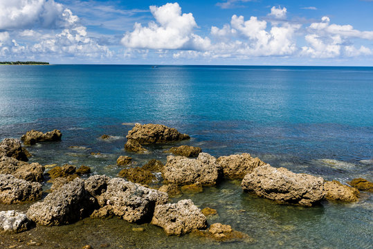 Coastal reef and sea waves with blue sky in the Kending National Park of Pingtung, Taiwan.