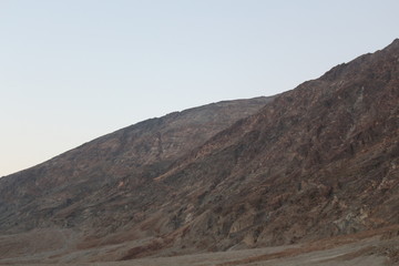 Badwater basin salt flats Death Valley at sunset in summer