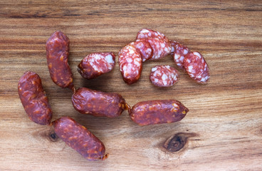 pepperoni sausage on a cutting board