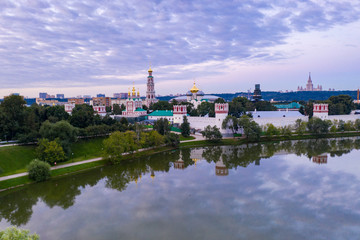 panoramic views of the city, the ancient fortress and the river at dawn filmed from a drone