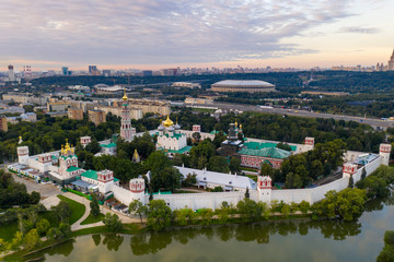 Fototapeta premium panoramic views of the city, the ancient fortress and the river at dawn filmed from a drone