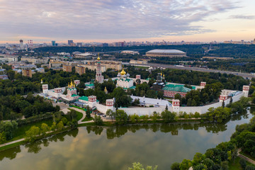 panoramic views of the city, the ancient fortress and the river at dawn filmed from a drone
