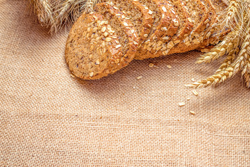 Baguette bread. Rye bakery with crusty loaves and crumbs. Fresh loaf of rustic traditional bread...