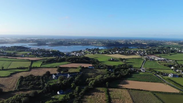 beautiful drone view of Cote des Aber Here, sea meets untamed coastline and the tides make inroads into the green landscape. Majestic lighthouses keep watch at the entrance to these havens of peace